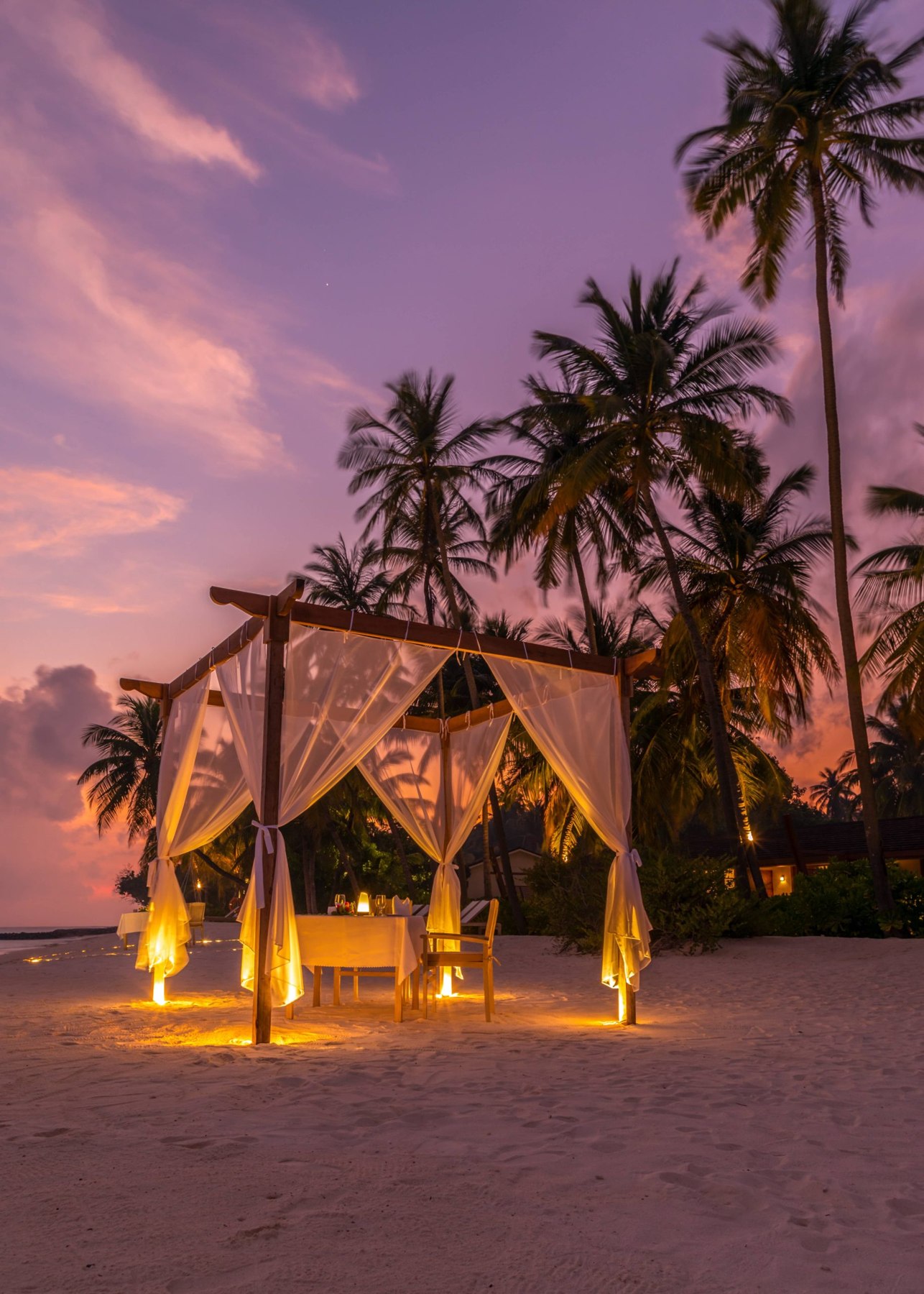 Private dinner under the pergola at Fiyavalhu Maldives