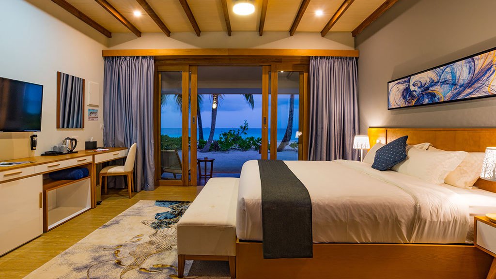 Pool Villa bedroom at Fiyavalhu Maldives