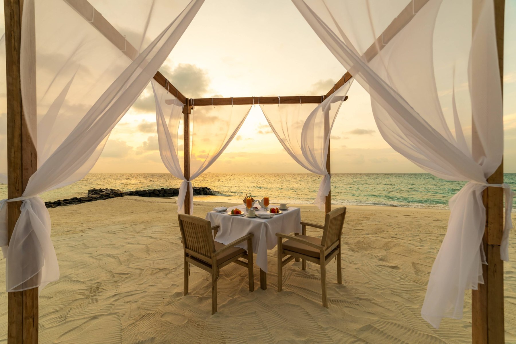 Sunrise breakfast on the beach at Fiyavalhu Maldives